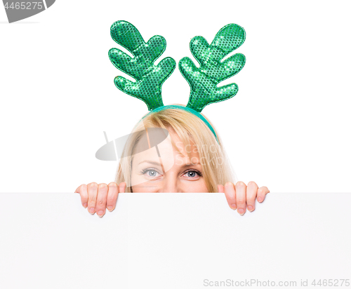 Image of Christmas woman showing empty blank