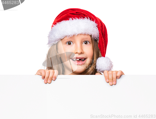 Image of Girl in santa hat with blank