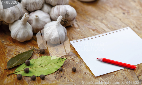 Image of blank with pensil with garlic