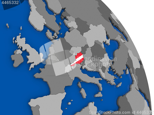Image of Austria and its flag on globe