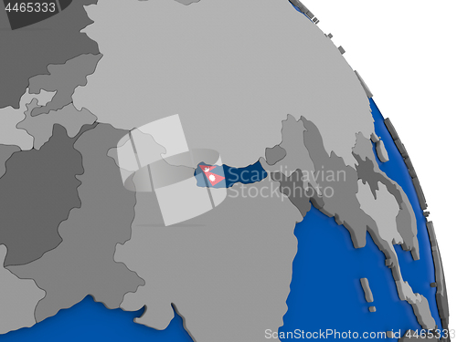 Image of Nepal and its flag on globe