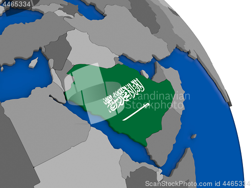 Image of Saudi Arabia and its flag on globe