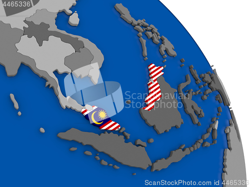 Image of Malaysia and its flag on globe