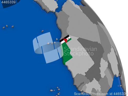 Image of Western Sahara and its flag on globe