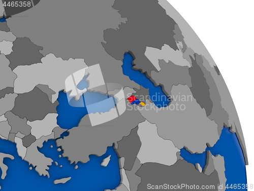 Image of Armenia and its flag on globe