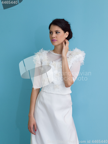 Image of beautiful young women in wedding dress