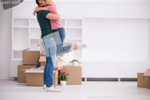 Image of happy Young couple moving in new house