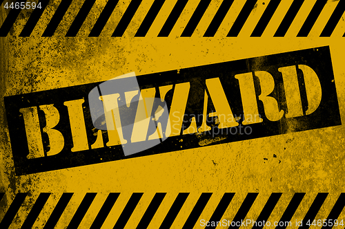 Image of Blizzard sign yellow with stripes