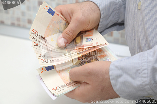 Image of Counting Euro Cash