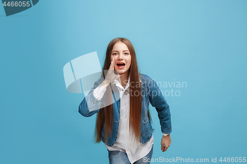 Image of Isolated on pink young casual teen girl shouting at studio