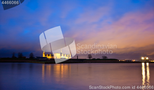 Image of Kronborg Castle at night seen from Elsinore harbour