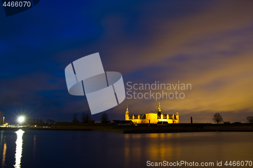 Image of Kronborg Castle at night seen from Elsinore harbour