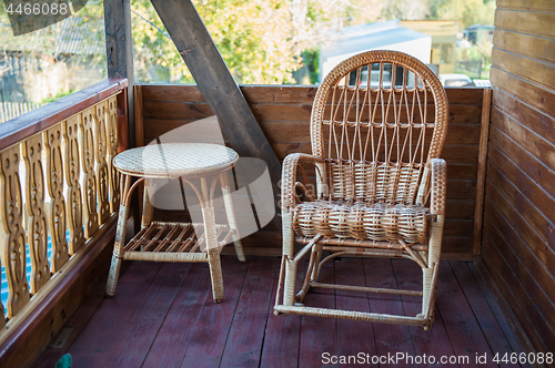 Image of wood furniture in rustic veranda