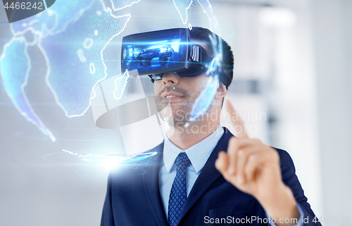 Image of businessman with virtual reality headset at office