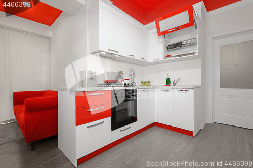 Image of Modern red and white kitchen interior