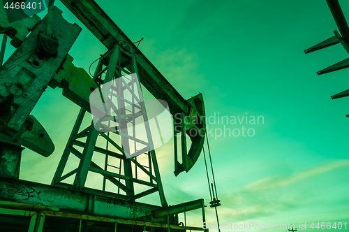 Image of Oil pump.Oil pump jack. Extraction of oil. Petroleum concept.