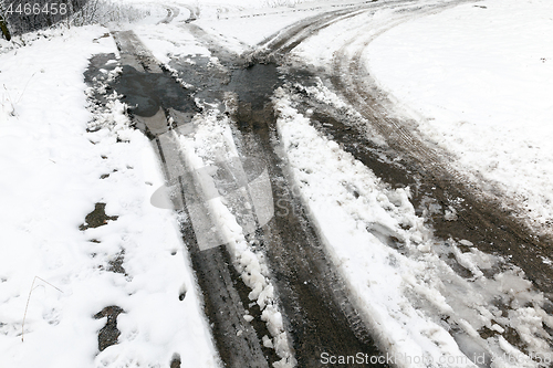 Image of traces of the car on snow