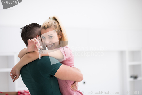 Image of happy Young couple moving in new house