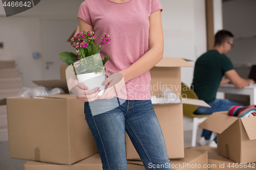 Image of young couple moving into a new home