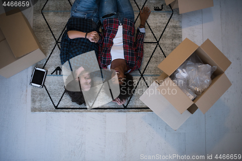 Image of Top view of attractive young multiethnic couple