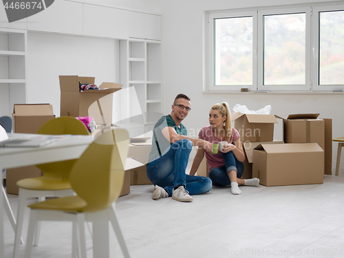 Image of young couple in new house