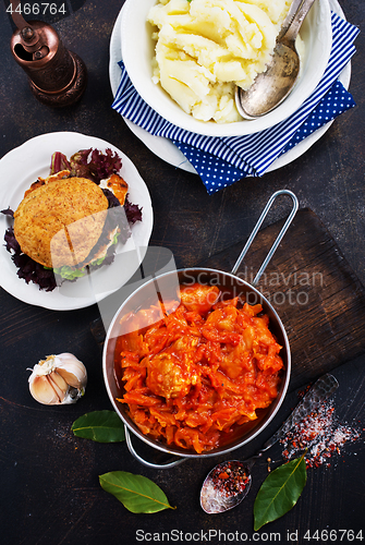 Image of fried cabbage and mashed potato