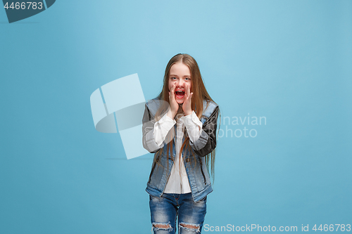 Image of Isolated on pink young casual teen girl shouting at studio