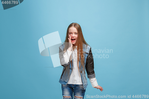 Image of Isolated on pink young casual teen girl shouting at studio