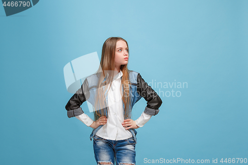 Image of Young serious thoughtful teen girl. Doubt concept.