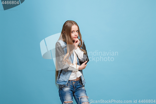 Image of Young serious thoughtful teen girl. Doubt concept.