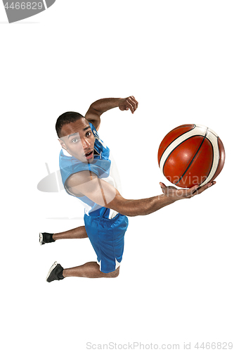 Image of Full length portrait of a basketball player with ball