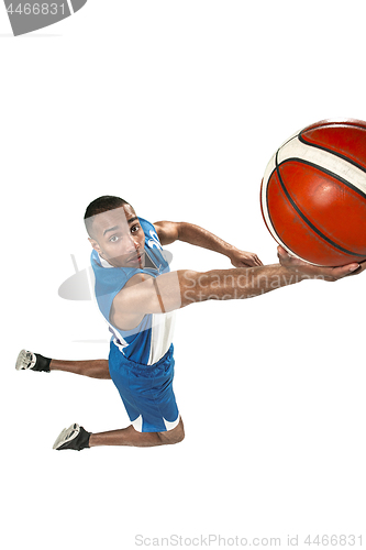 Image of Full length portrait of a basketball player with ball