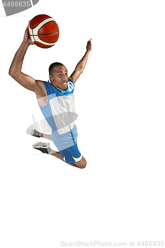 Image of Full length portrait of a basketball player with ball