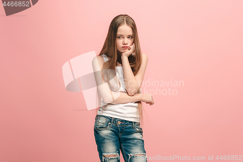 Image of Young serious thoughtful teen girl. Doubt concept.