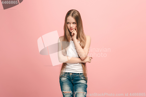 Image of Young serious thoughtful teen girl. Doubt concept.