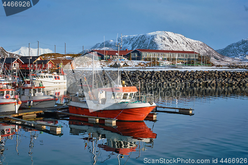 Image of Fishing boats and yachts on pier in Norway