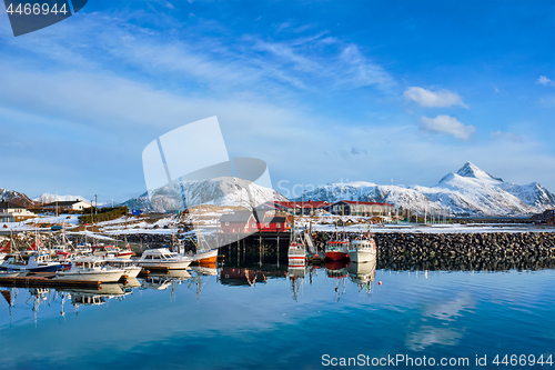 Image of Fishing boats and yachts on pier in Norway