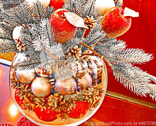 Image of Christmas holidays composition with red apples and glass vase