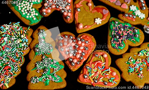 Image of Homemade christmas cookies on a dark table