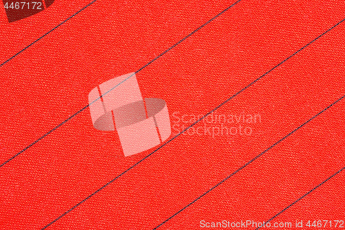 Image of Abstract red fabric with black stripes texture background. Book cover.