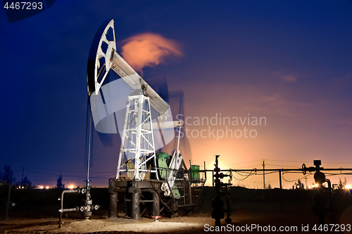 Image of Oil Rig at night.