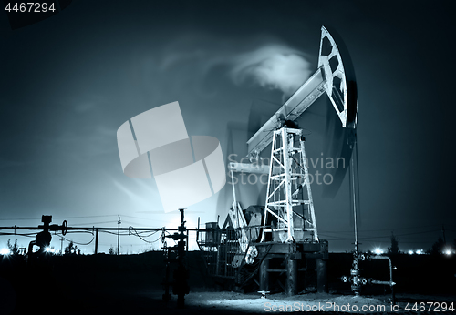 Image of Oil Rig at night.