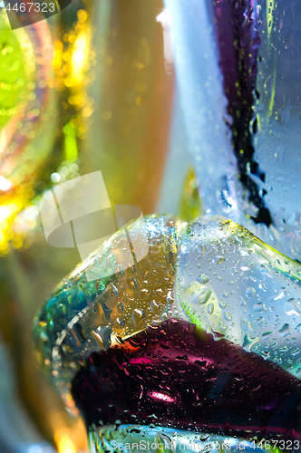 Image of Bright colorful abstract background. Glass and drops of water.