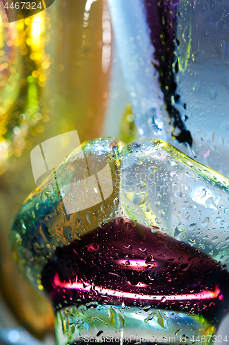 Image of Bright colorful abstract background. Glass and drops of water.