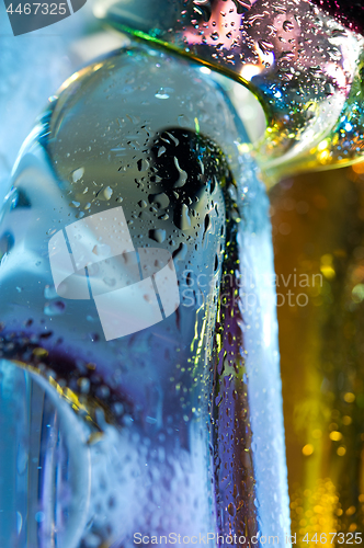 Image of Bright colorful abstract background. Glass and drops of water.