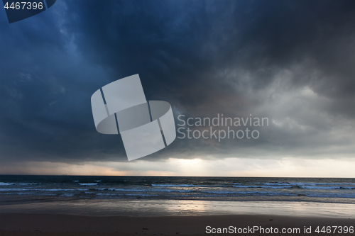 Image of Gathering storm on beach