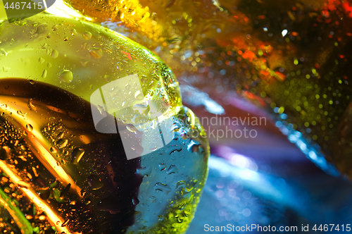 Image of Bright colorful abstract background. Glass and drops of water.