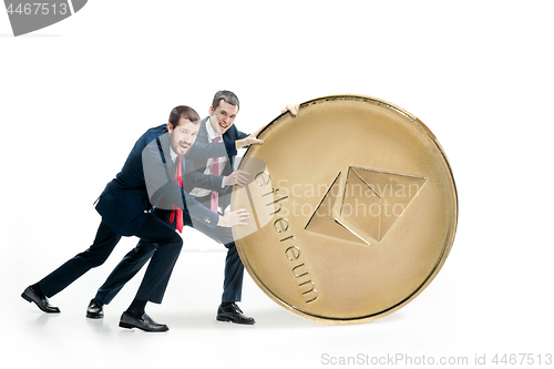 Image of Two business men holding business icon