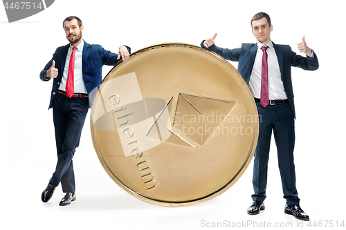 Image of Two casual man holding business icon