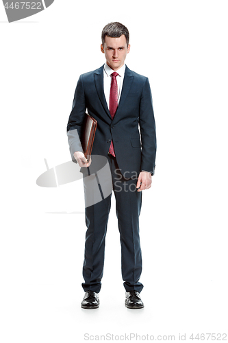 Image of Full body portrait of businessman with folder on white